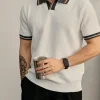 Herren-Polohemd aus Strick mit kontrastierendem Kragen