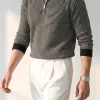 Jersey polo de punto a rayas con cremallera de un cuarto para hombre, hecho a medida
